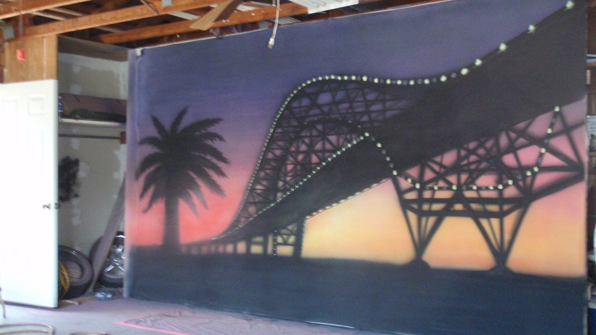 Murals painted on canvas and mounted onto the wall at the It'll Do Saloon in Corpus Christi, Texas.